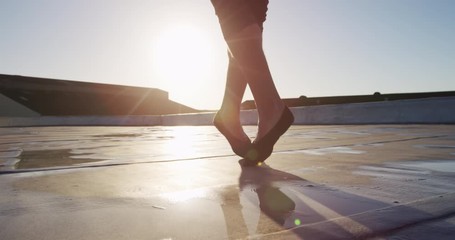 Male dancer on a rooftop - Powered by Adobe