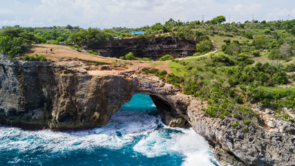 Stunning aerial view of the Broken Beach. Broken Beach locally known as Pantai Pasih Uug is one of the top picturesque and most visited destinations on Nusa Penida Island, Bali, Indonesia.