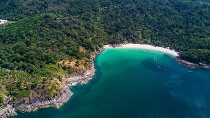 Aerial shooting of Freedom beach, Phuket, Thailand. Beautiful tropical island with white sand beach and turquoise clear water