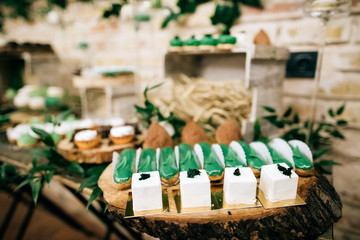 Candy bar. Table with different sweets for party