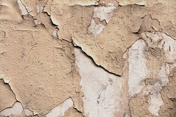 Vintage background of textured old uneven wall surface