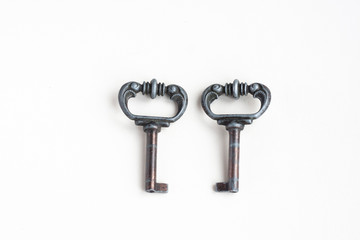 Metal vintage keys isolated on white background