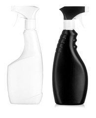 Black plastic bottles of cleaning products and flower