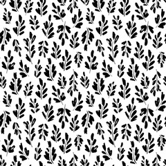 Leaves and branches vector seamless pattern. Organic motif, herbs element painted with a brush.