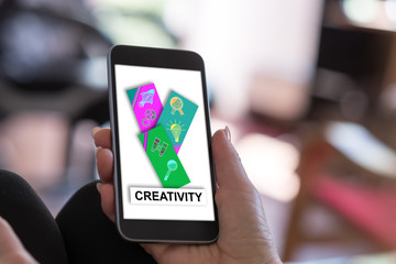 Creativity concept on a smartphone