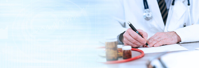 Doctor writing a medical prescription; panoramic banner