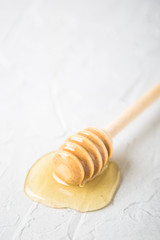 Natural flower honey in a glass jar