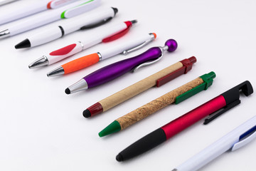 Pens made of different materials and colors with different styles and designs
