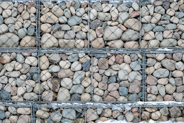 Abstract architecture. Rock background. Texture element. Exterior element. Grey stone background. Natural stone surface. Modern urban architecture.