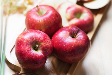 Fototapeta na wymiar Close-up rotation of organic red apple rotating in background