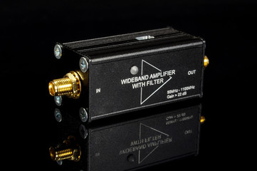RF wideband amplifier isolated on the black background
