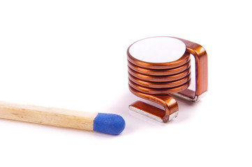 High power SMD coil in comparison with match head