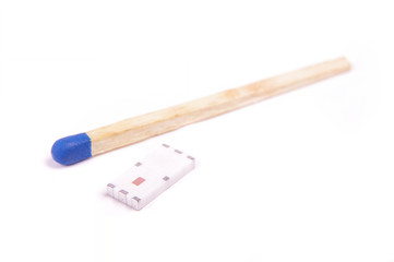 Tiny SMD chip antenna in comparison with match head isolated