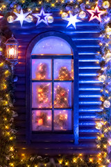 Winter frozen background. Christmas decorations. Frozen window with unfocused festive interior inside for decorative design. Holiday celebration.