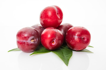 fresh plum isolated on white background