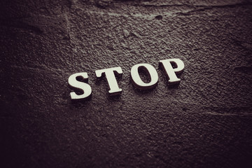 STOP Written On Blackboard. Stop Text
