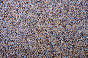 Fototapeta premium Floor coating composed of small pebbles agglutinated. Pebble floor decorative coating.