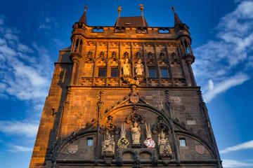Tower of Charles bridge in Prague at sunrise, Czech Republic