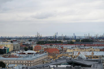 View on the top of the roofs of Saint Petersburg. View on of St. Petersburg city from the colonnade of St. Isaac's.