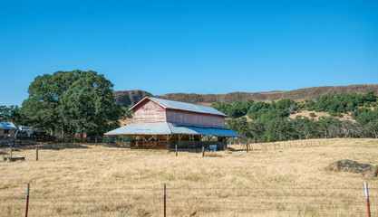 California rural landscape. Fields and Old Wooden Barn