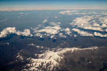 Top View from plane to snow capped peaks of Caucasus Mountains