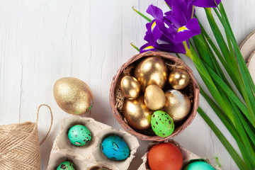 Many Easter eggs decorated with floral branches