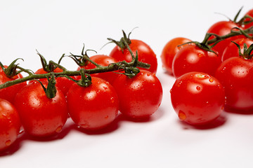 fresh raw tomatoes isolated on white background