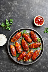 Bacon wrapped grilled chicken wings
