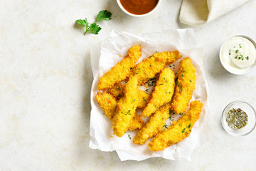Crispy fried breaded chicken breast strips