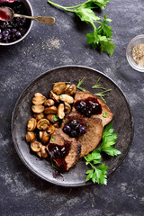 Beef with mushrooms and blueberry sauce