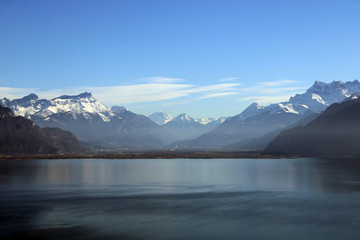 Fototapeta premium Lake and Snowed Mountains