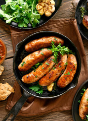 Roasted sausages in frying pan
