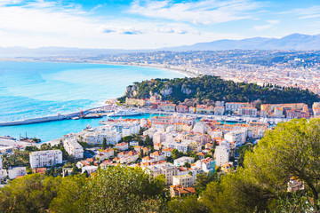 Fototapeta na wymiar scenery panoramic aerial cityscape view of harbour Nice, France. Landscape of harbor, port in Nice. Cote d'Azur France.Villefranche sur Mer, France. Seaside town on the French Riviera