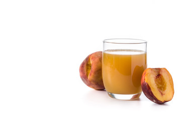 Peach juice in glass isolated on white background. Copy space