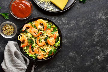Pasta with shrimp, broccoli and parmesan cheese