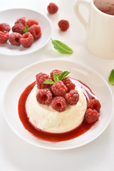 Panna cotta with fresh raspberries