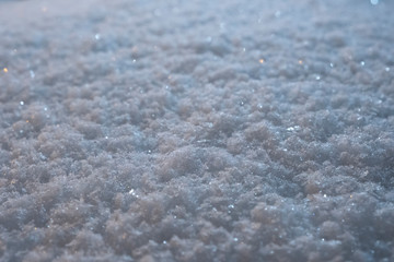 Glittering snow texture background.