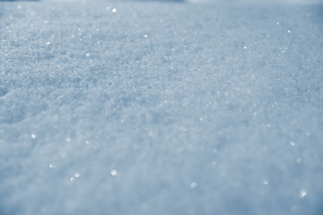 Glittering snow texture background.