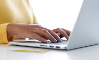 Women use laptop register via credit cards to make online purchases, Online shopping or Internet technology concept.