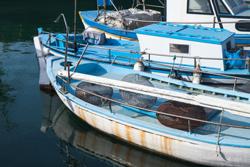 Traditional Greek fishing boats with sea fish traps