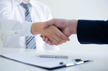 Business people shake hands to congratulate new employees in interviews after meeting in office, job interview Concept.