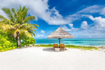 Beach chairs and umbrella in paradise beach. Tropical vacation holiday banner, summer landscape