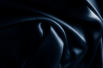 Satin blue silk background, close-up