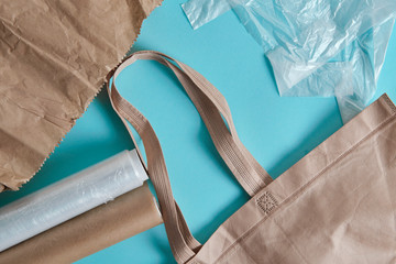 Brown empty Tote Bag next to eco unfriendly pouches and wrap