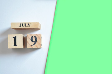 July 19, Empty white - green background.