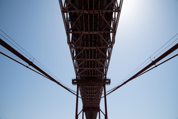 25 april bridge in lisbon on background of blue sky