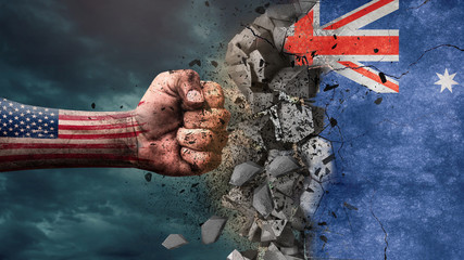 Fist breaking rock. USA destroying Australia