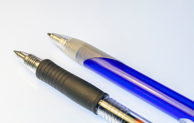 Ball point pens on white background