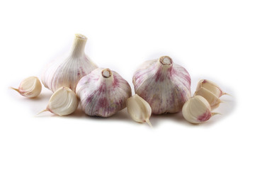 Garlic and garlic cloves isolated on white