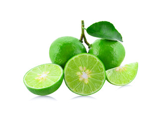 Green lemons isolated on white background